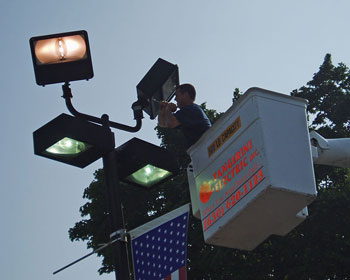 Servicing parking lot lighting